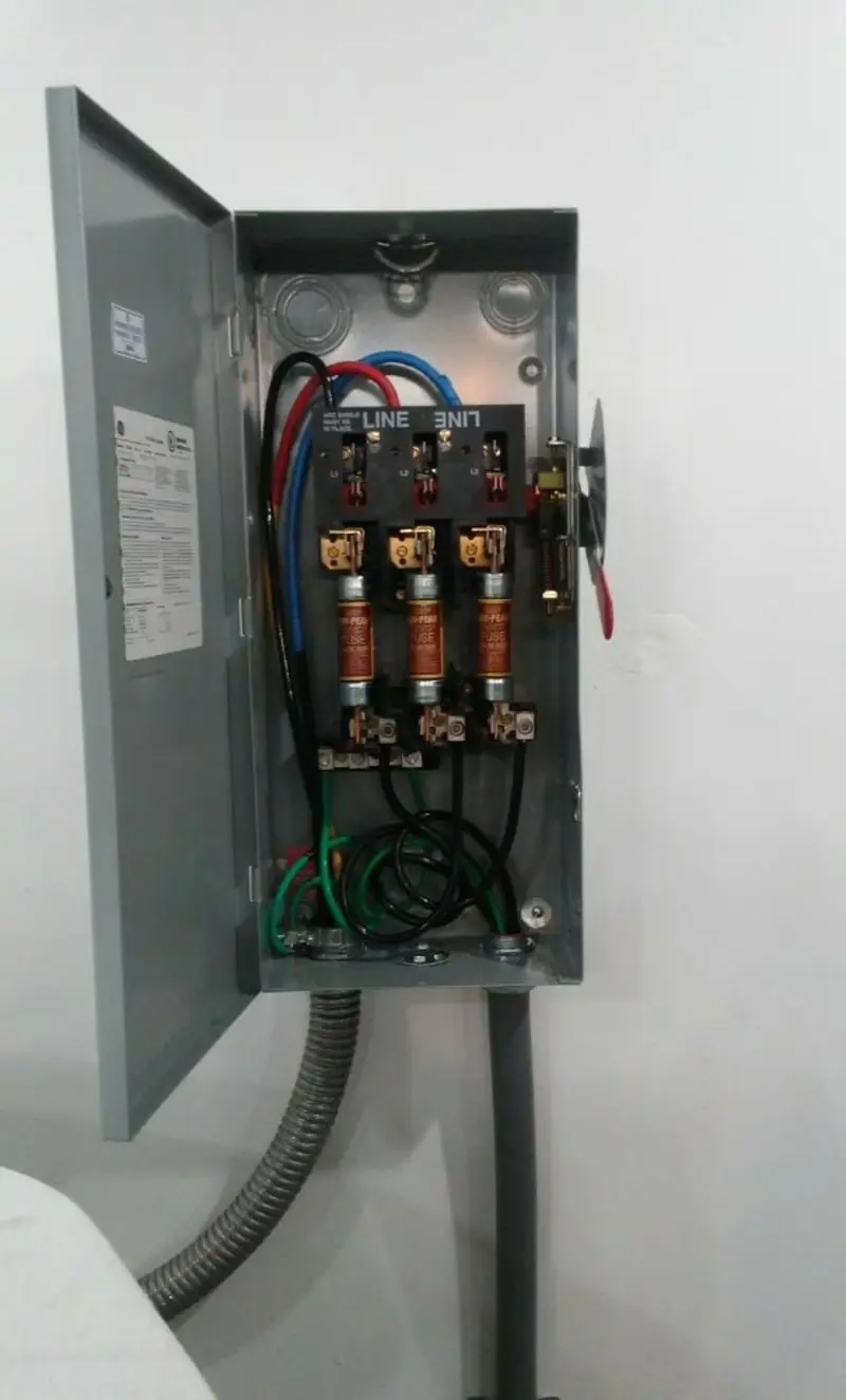 Three-phase disconnect switch installed for Smoke Detector Installation in Kenmore
